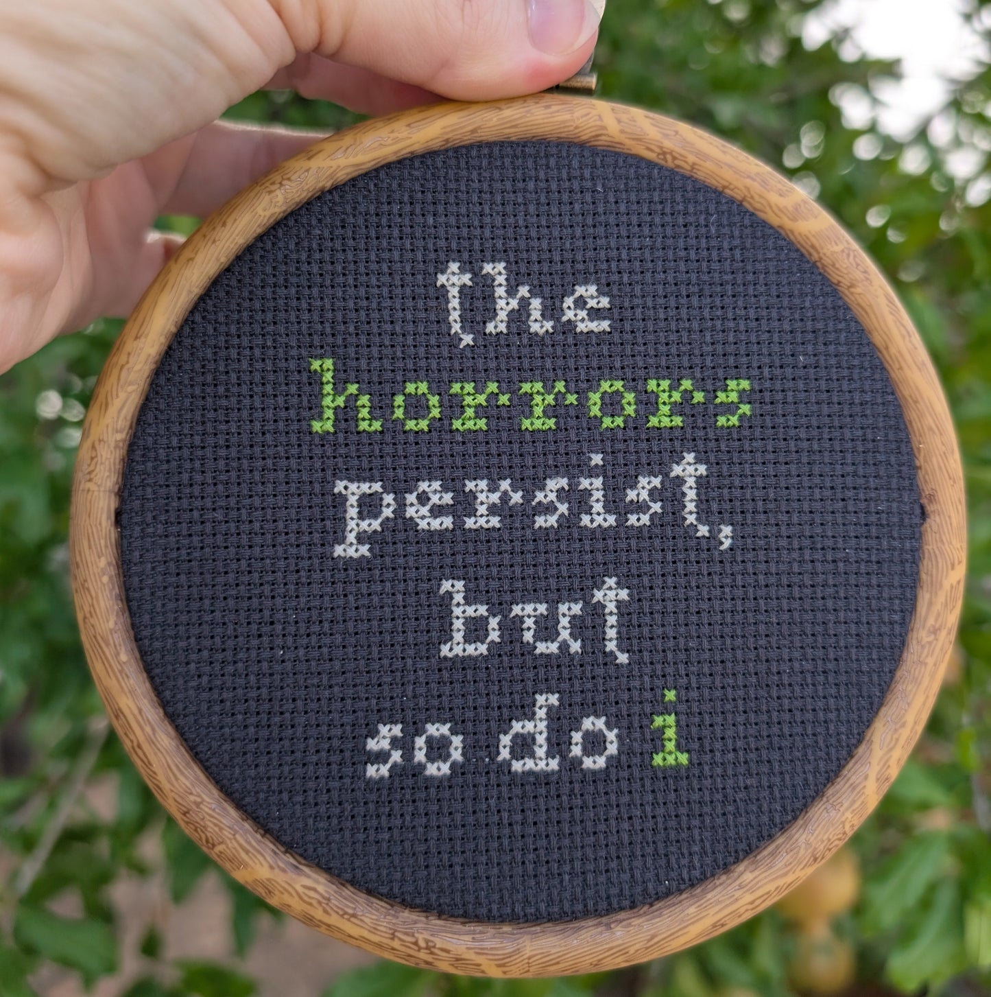 "The Horrors Persist, But So Do I" Wall Art